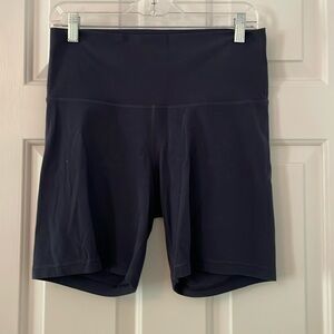 Aritzia Tnaction Butter Biker shorts in Navy. size Large
